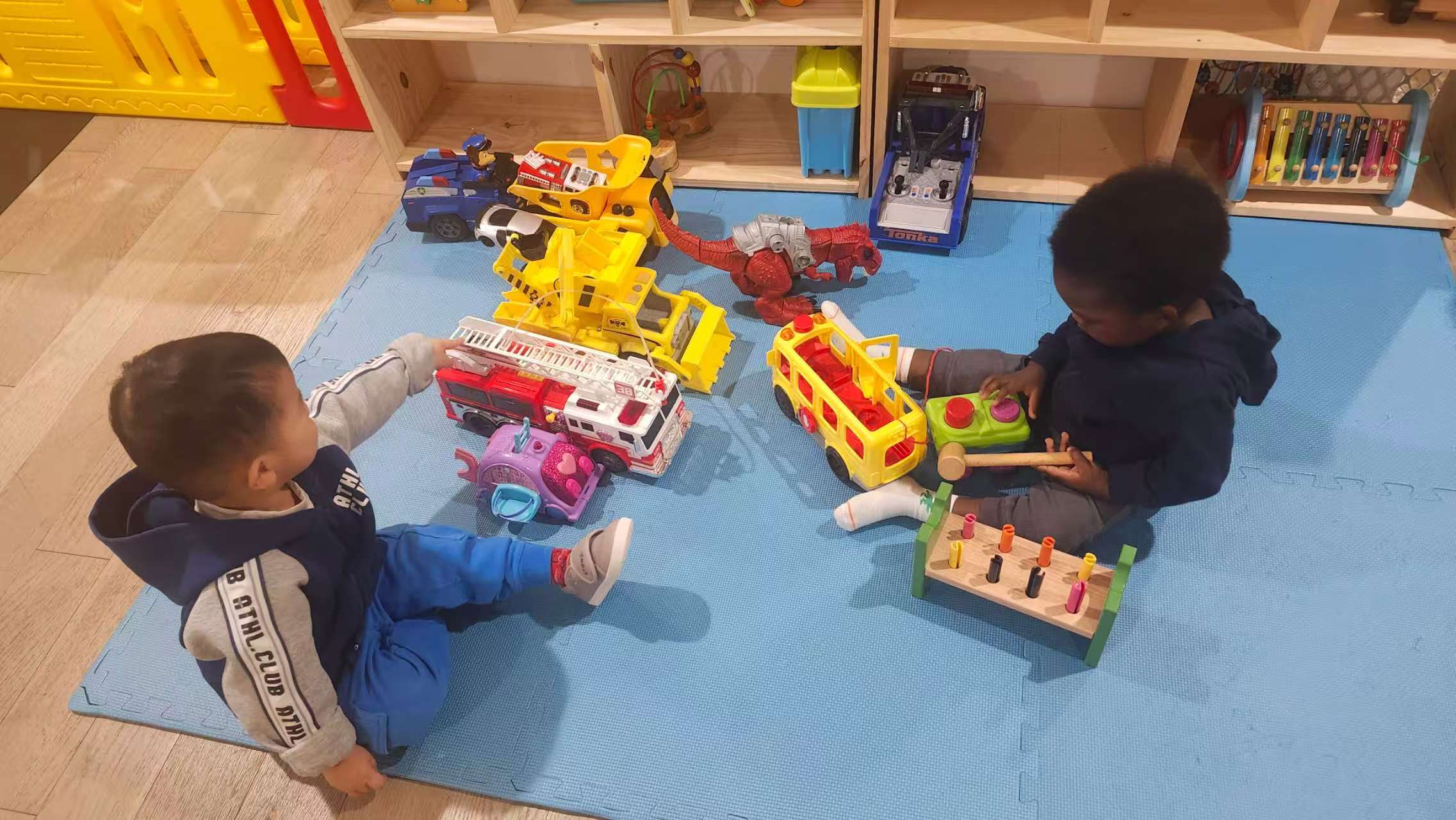 Focused, curious little builders at work